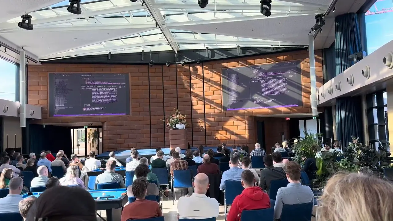 Wouter speaking to 127 developers at AFAS headquarters.